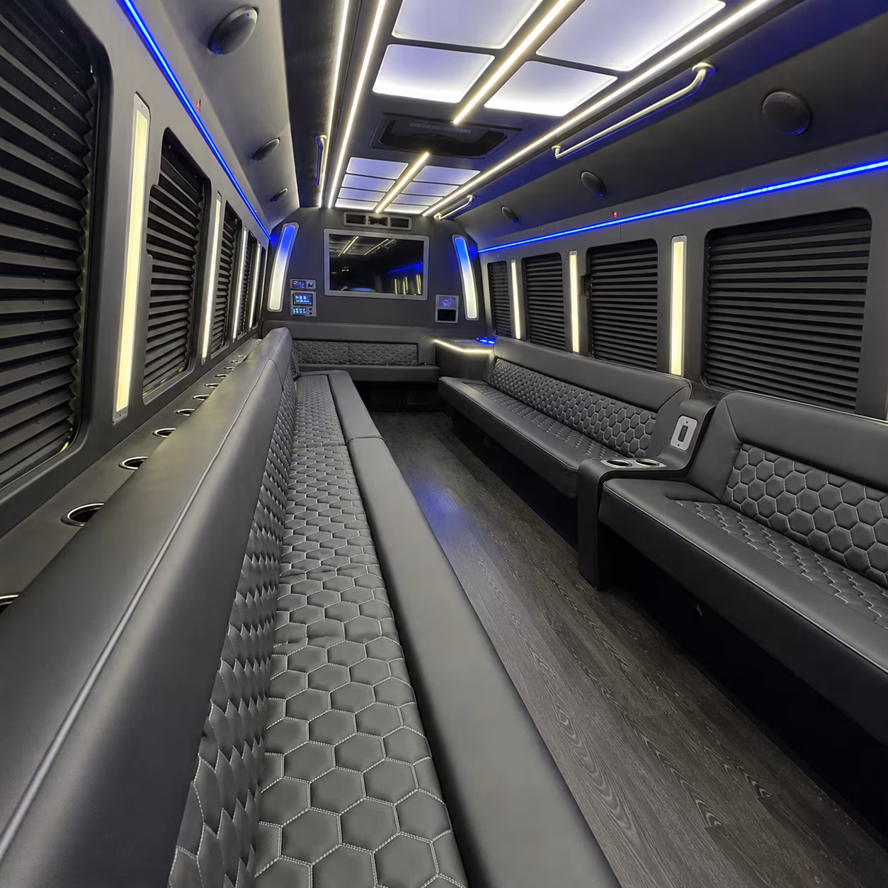 Wedding guests seated inside a party bus serving Aurora